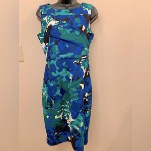 Calvin Klein sleeveless faux wrap dress in blues, green, black & white. Size 6.